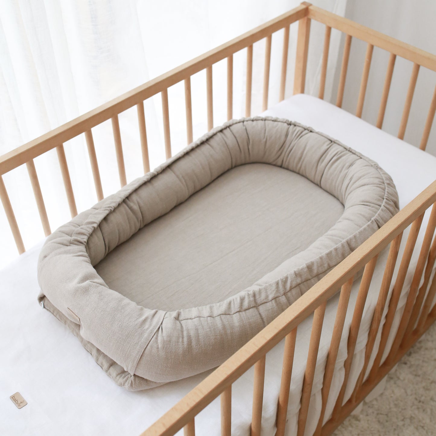 Babynest i tvättad bomull - beige